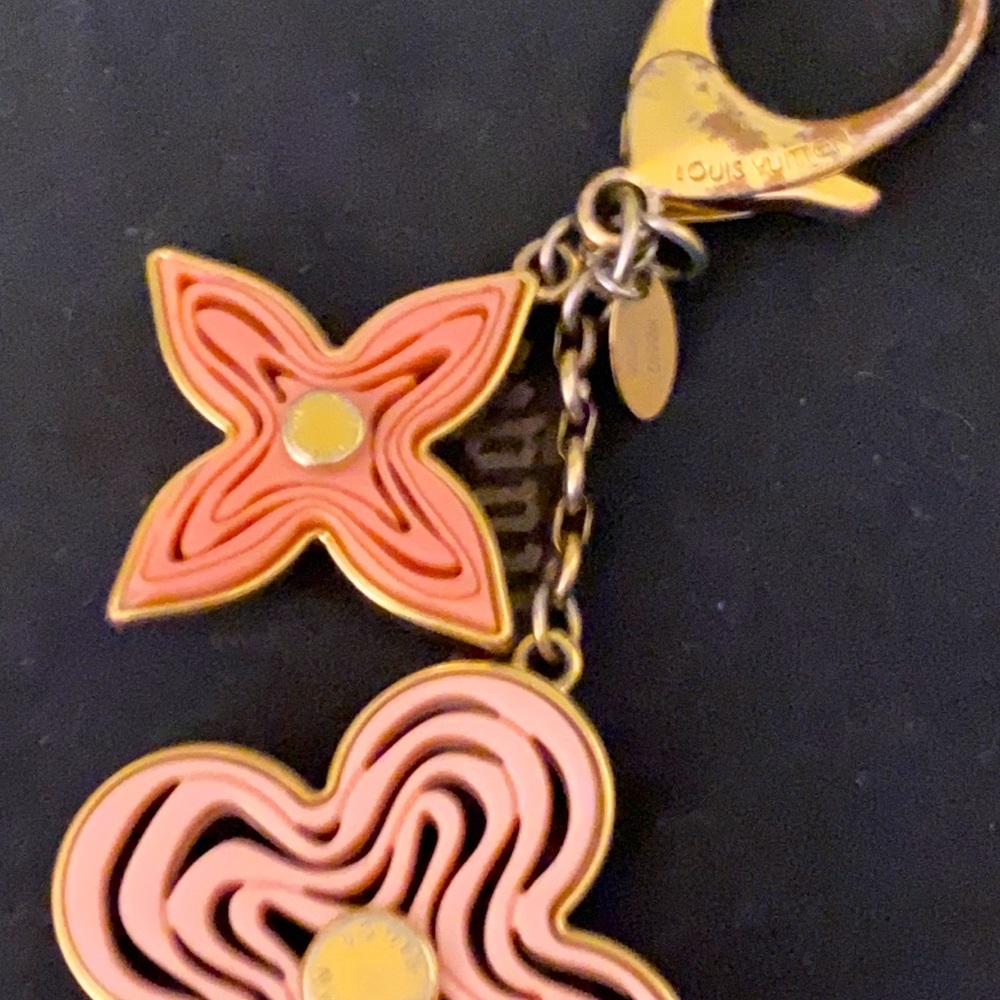 Lv bag charm pre-loved and well loved.